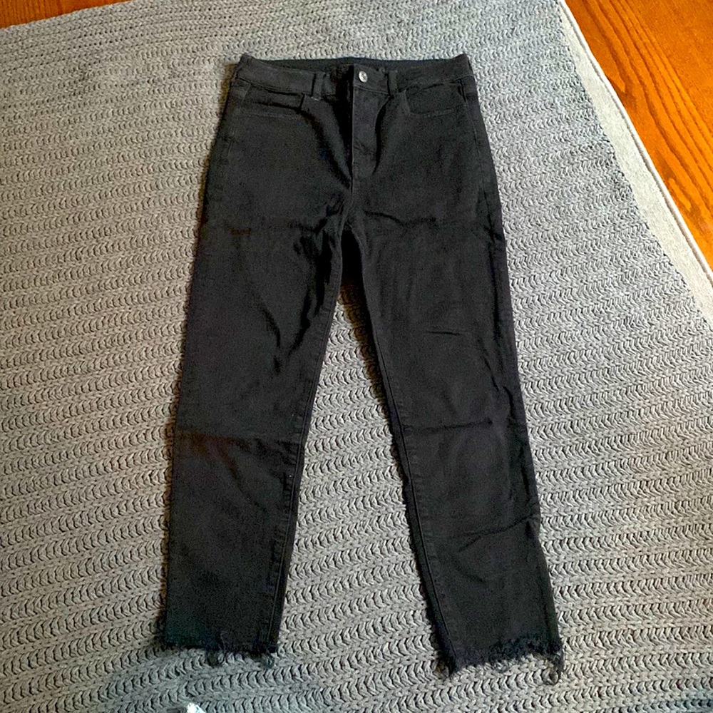 Black American eagle super high rise jegging, distressed bottom size 10